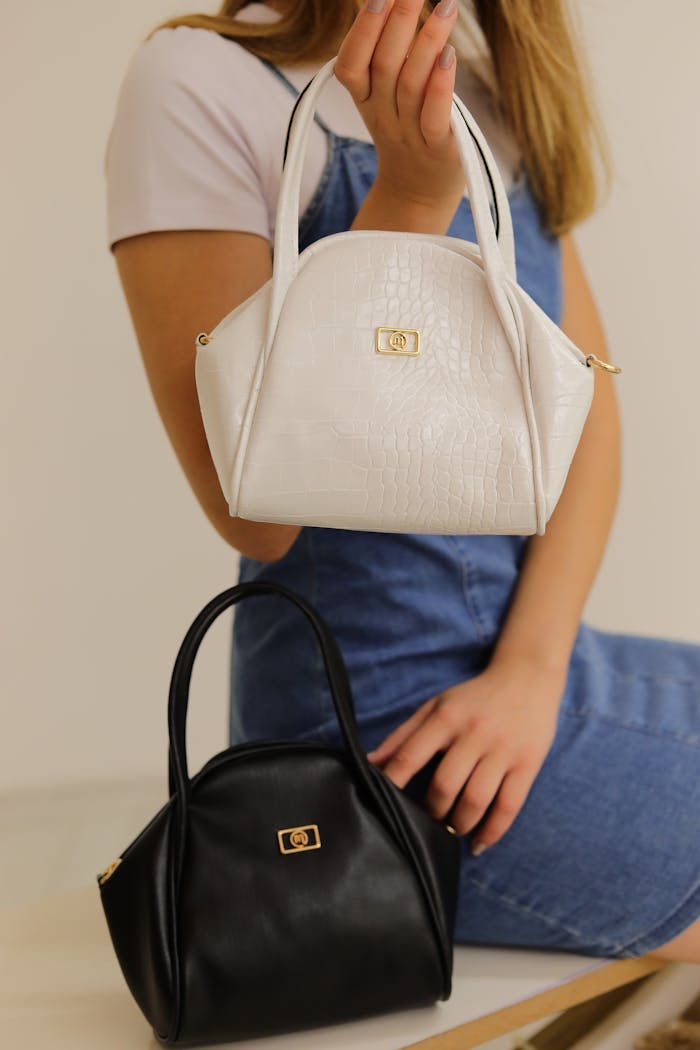 Woman Holding Bags in a Studio